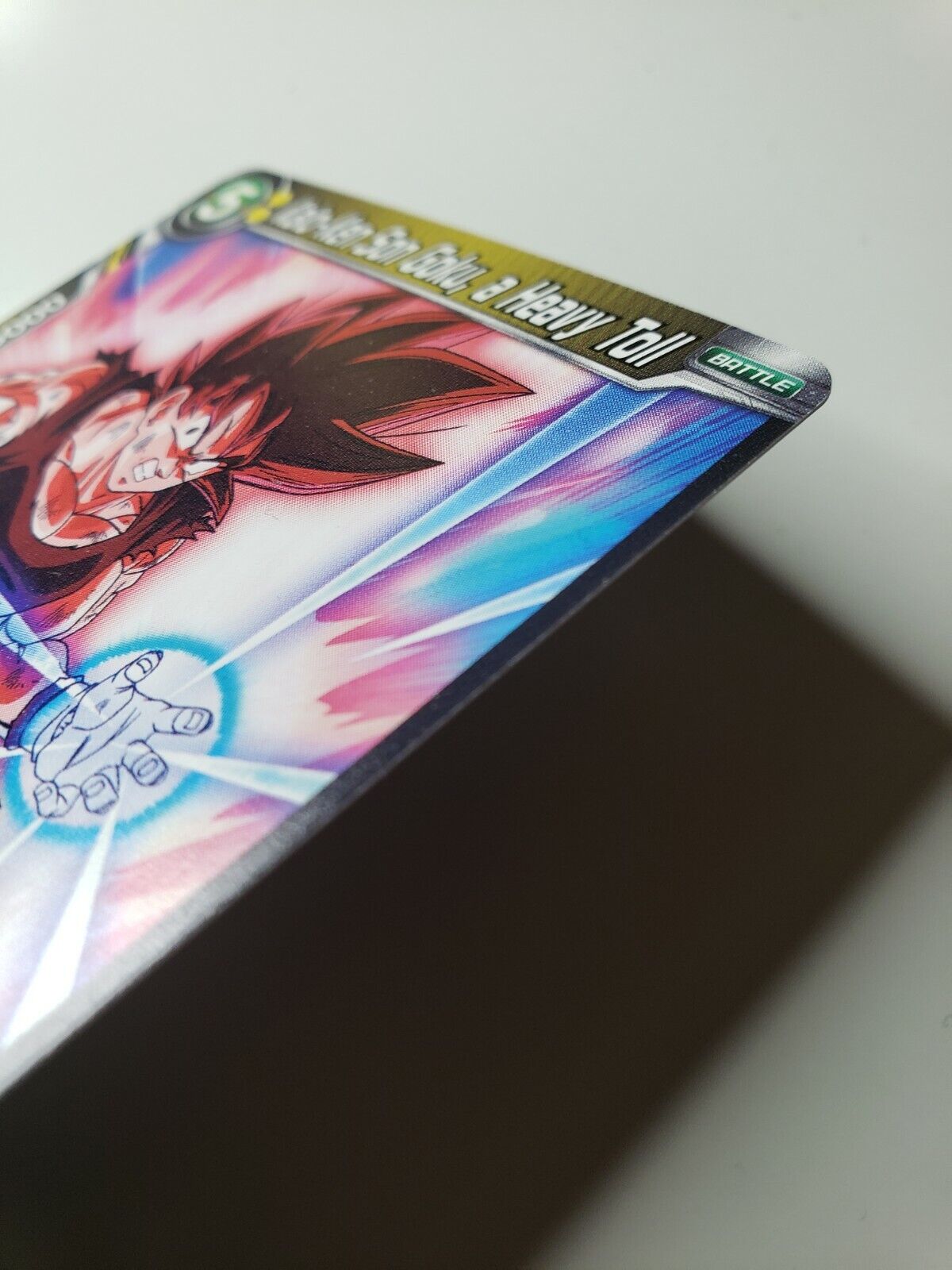 Kaio-Ken Son Goku, a Heavy Toll Dragon Ball Super card game UWS Base Card