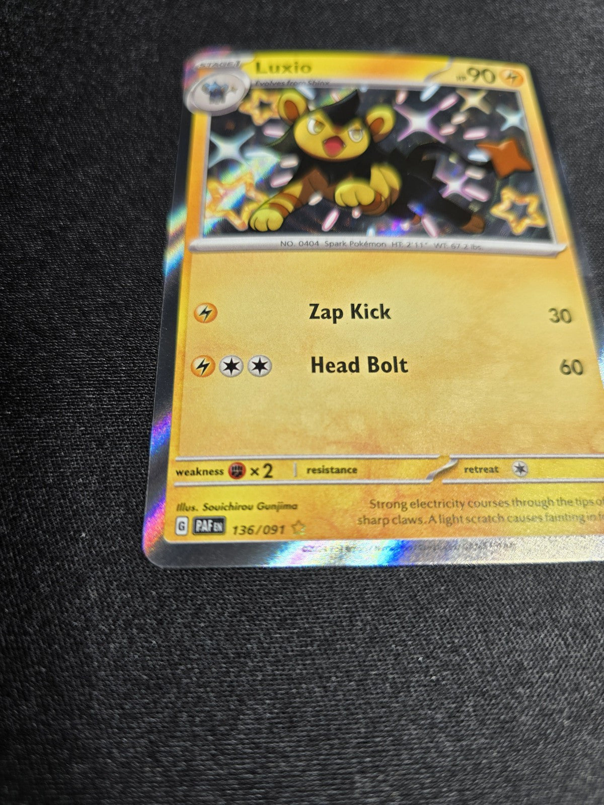 Pokemon TCG Card Paldean Fates Shiny Luxio 136/091 NM 2024