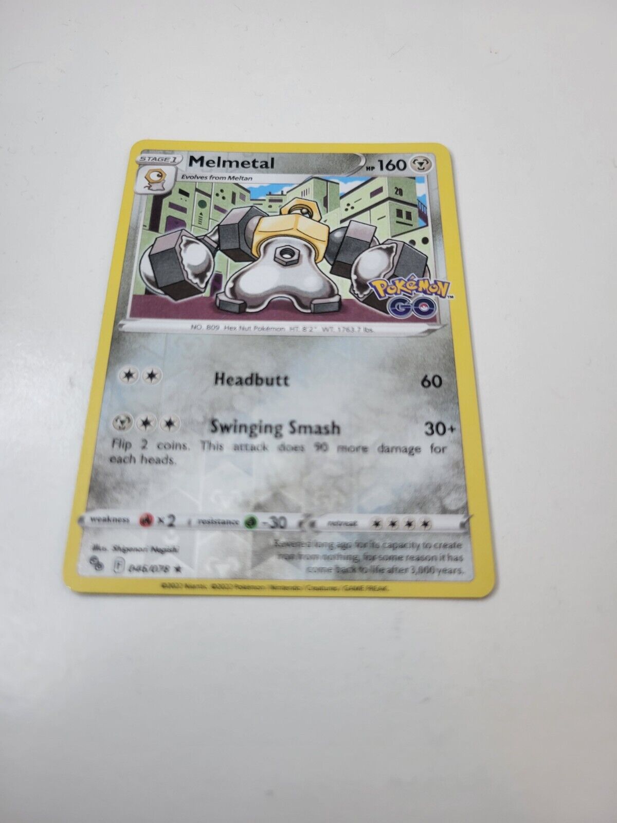 Pokémon TCG Melmetal Pokemon GO 046/078 Reverse Holo Rare Card NM 2022