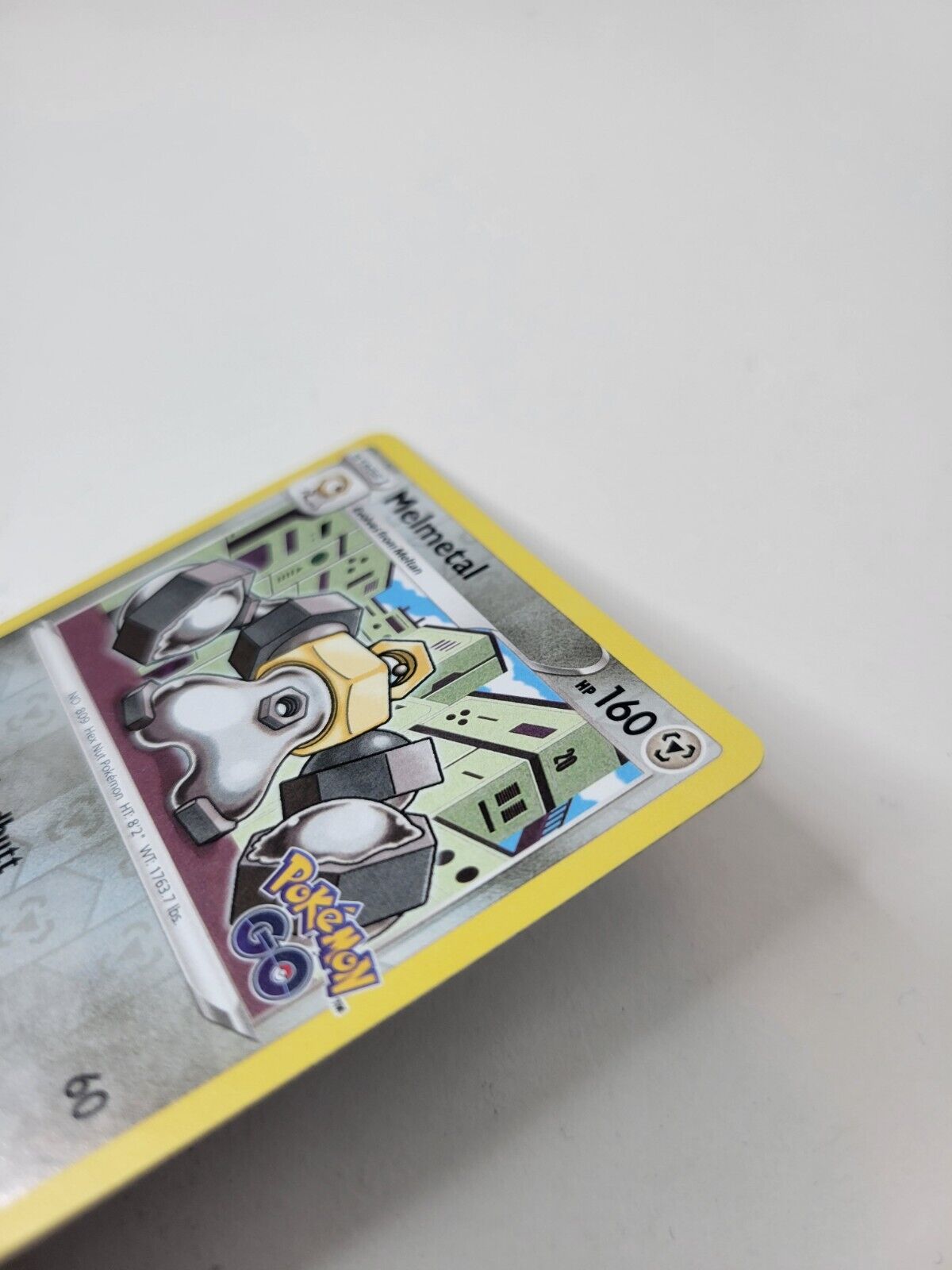 Pokémon TCG Melmetal Pokemon GO 046/078 Reverse Holo Rare Card NM 2022